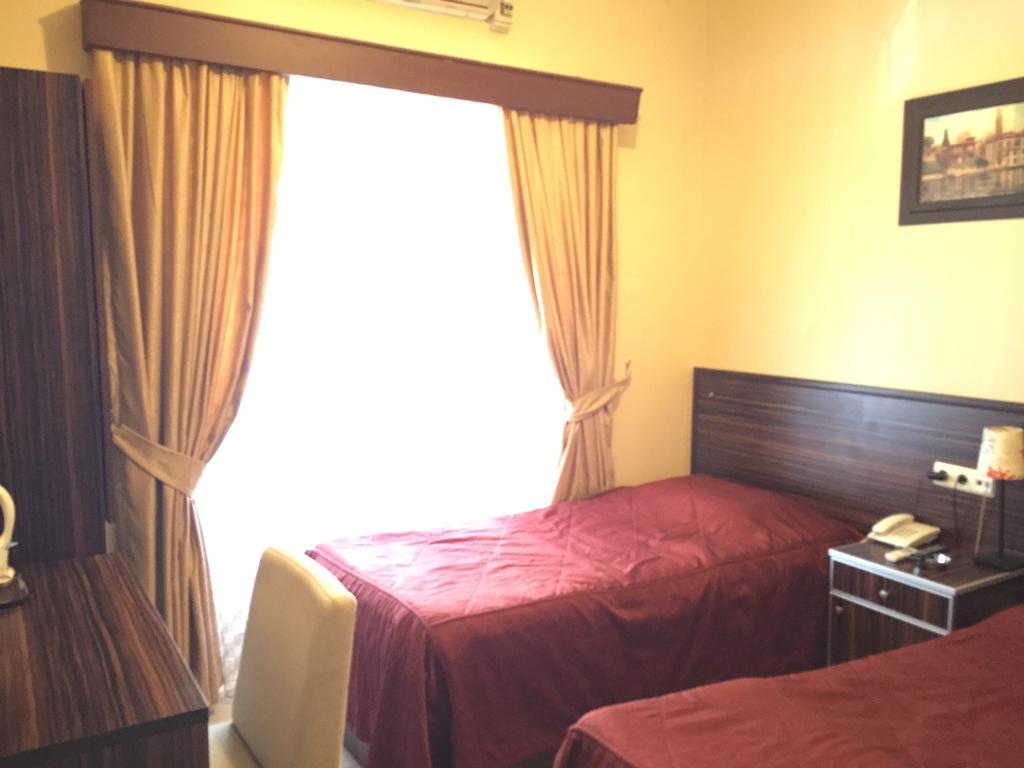 Hotel Mercan Adana Quarto foto